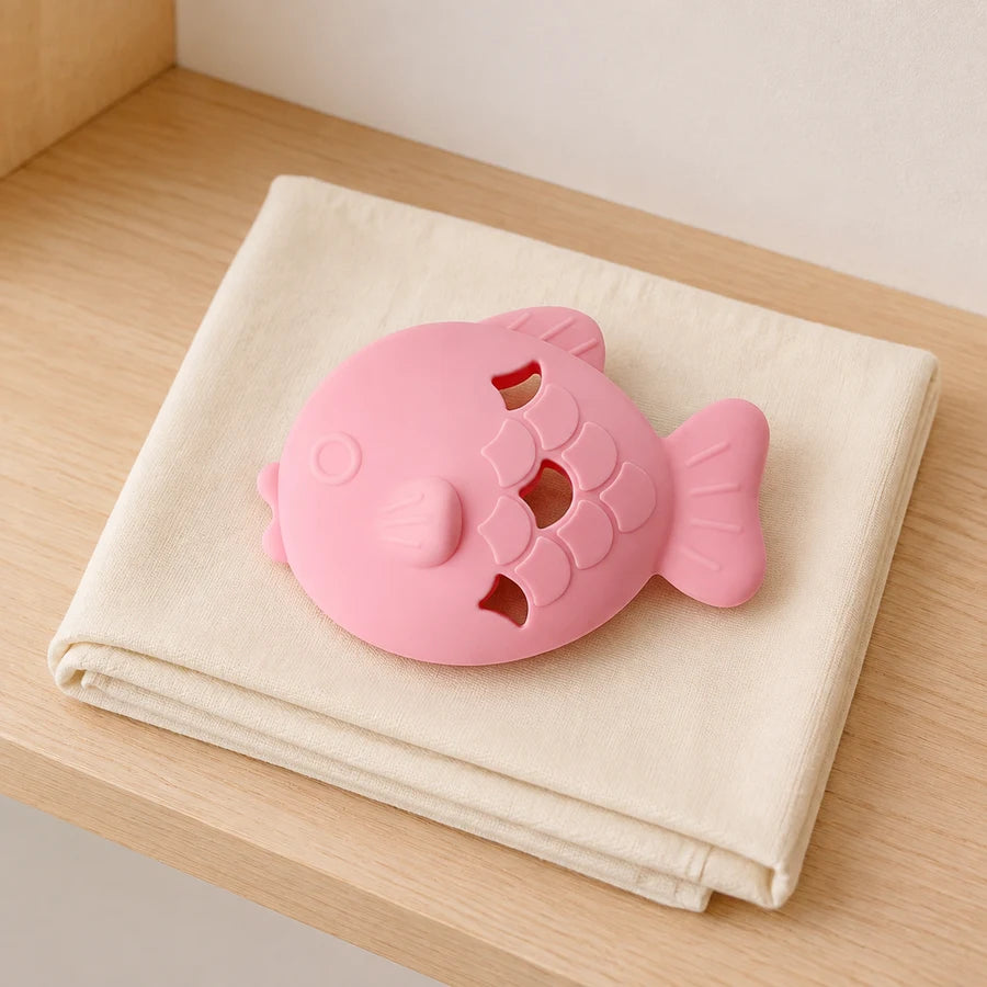 Pink PETEE Fishy Treat Pocket in a PETEE storage context