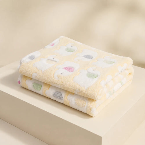 Yellow · 76 × 52 cm PETEE Little Elephant Blanket in a PETEE studio scene